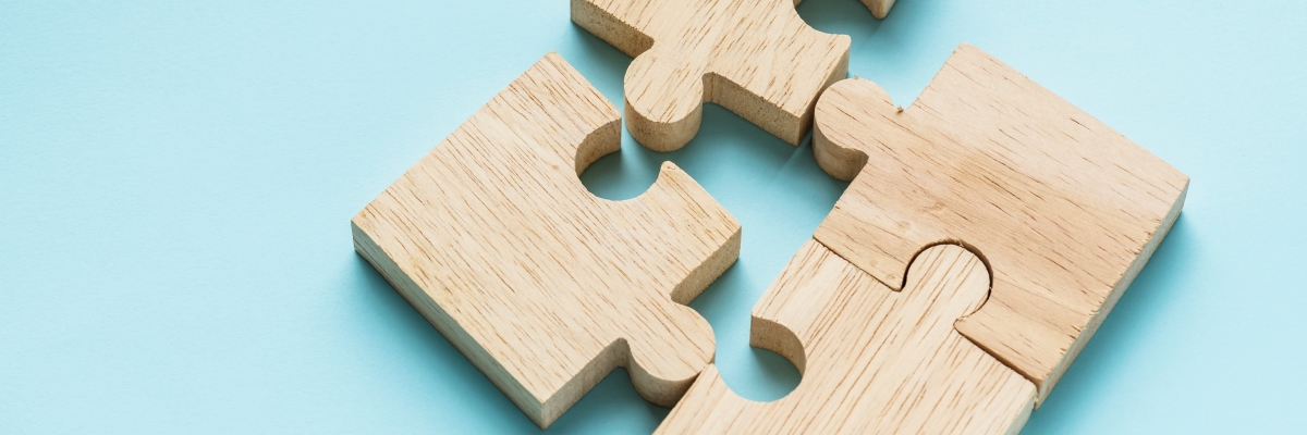 jigsaw-teamwork-concept-macro-shot_1200x400.jpg